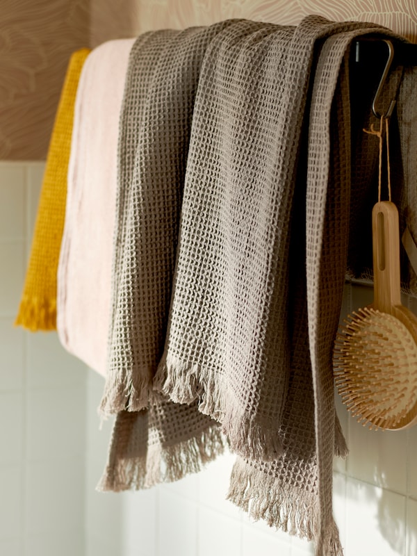  VALLASÅN light brown towel hung on a towel rail