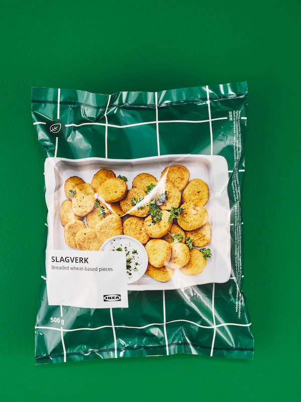 The packaging for SLAGVERK breaded wheat-based pieces against a green background.