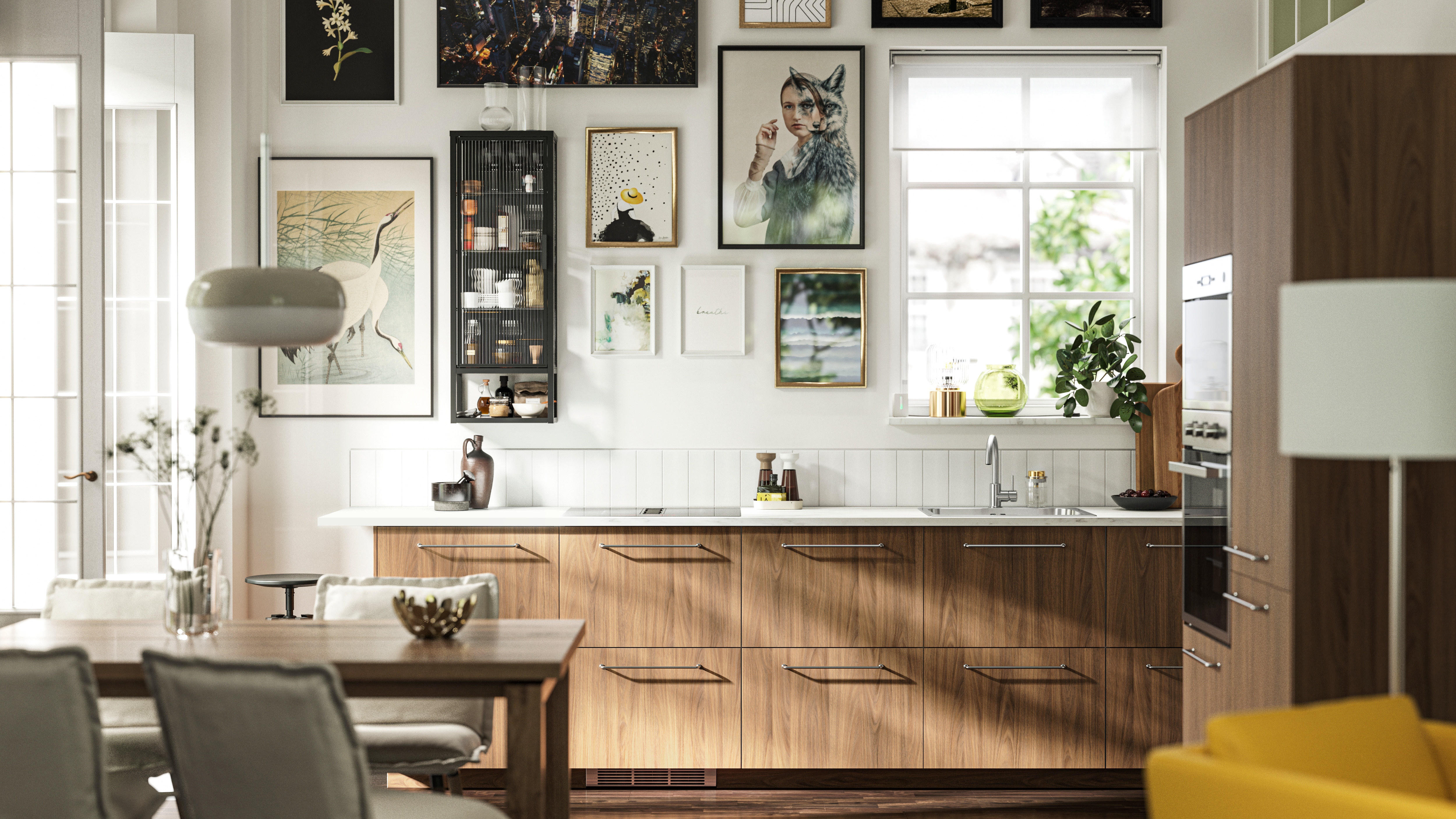 TISTORP modern wood effect kitchen with white ceramic worktop and golden handles.